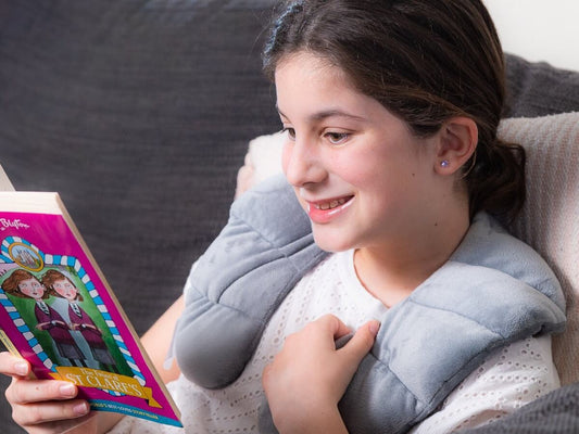 Girl_wearing_Elizabeth_richards_Weighted_Shoulder_Wrap_1.3kg_glass_beads