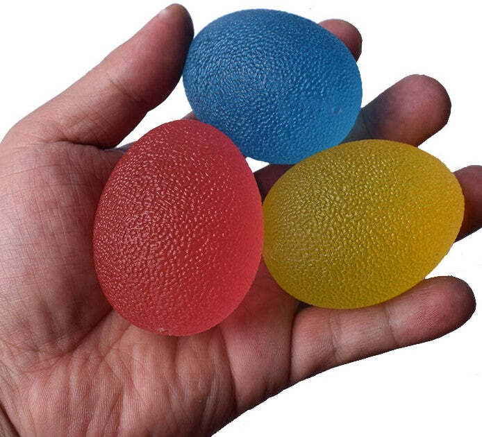 Elizabeth_Richards_Hand_Therapy_Egg_three_colours_in_hand