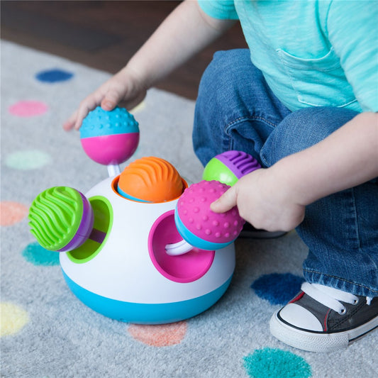 Fat_Brain_Toys_Klickity_boy_playing_with_product