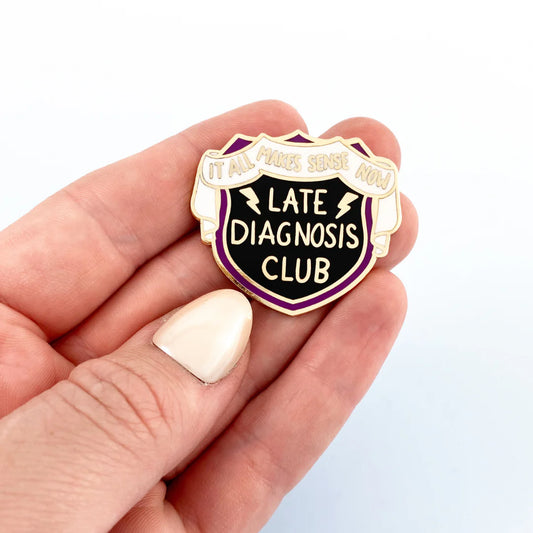 Jubly-Umph_Late_Diagnosis_Club_Lapel_Pin_hand