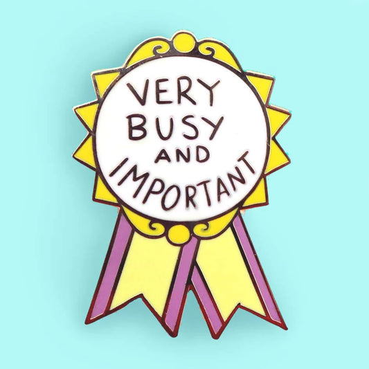 Jubly-Umph_Very_busy_and_important_Lapel_pin_on_aqua_background