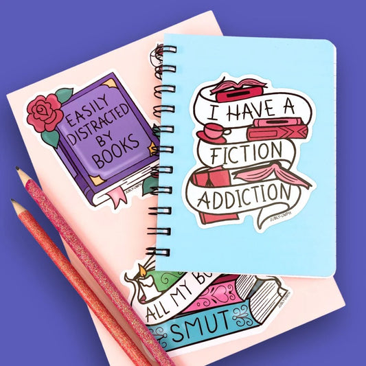 Jubly_Umph_I_have_a_fiction_addiction_sticker_on_book