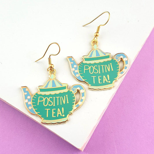 Jubly_Umph_Originals_Positivi_Tea_Pot_Earrings_purple_background