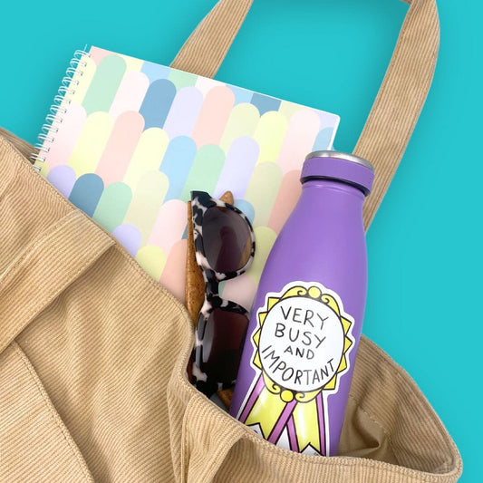 Jubly_Umph_Very_busy_and_important_sticker_on_bottle