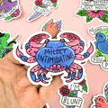 Sticker with a crab design and text on a colorful background