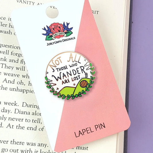 Jubly_Umph_not_all_who_wander_are_lost_enamel_pin_on_card