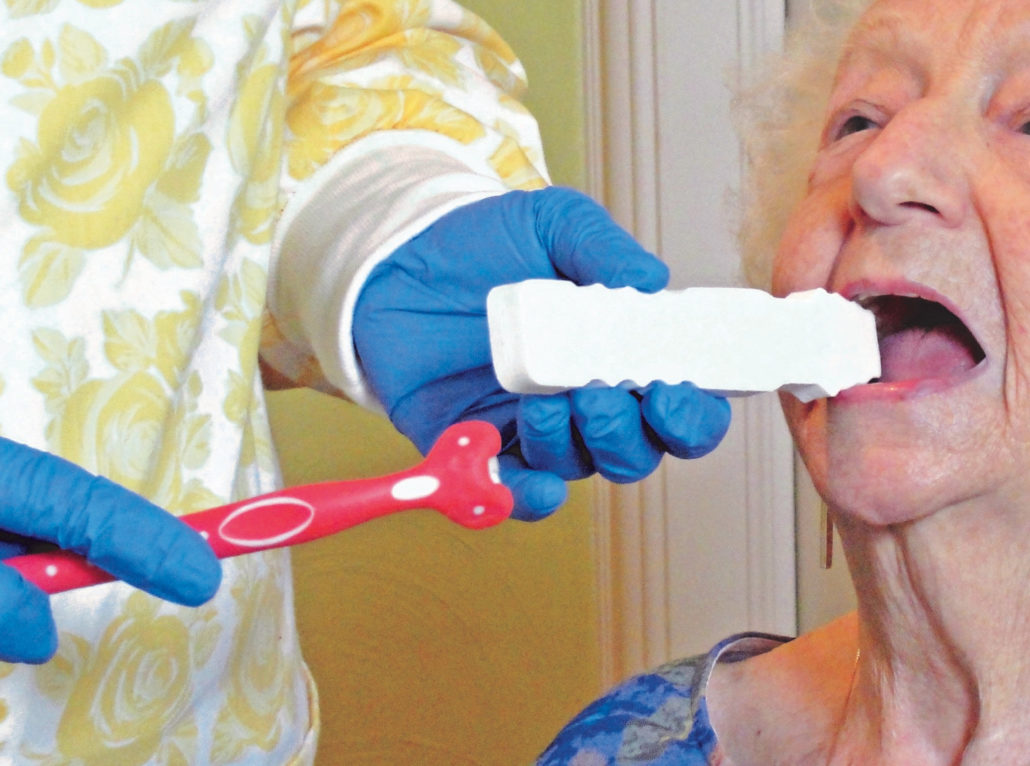 Surround_tooth_brush_with_STB_in_aged_care