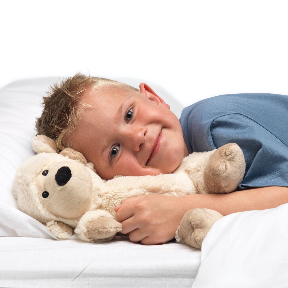 WARMIES_boy_snuggling_sheep