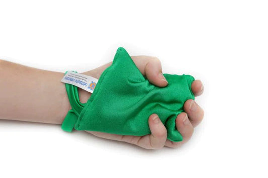 person_holding_lycra-crinkle-bean-bag-with-loop-green-sensory-matters