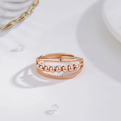 8_Beaded_rose_gold_anxiety_fidget_ring_table