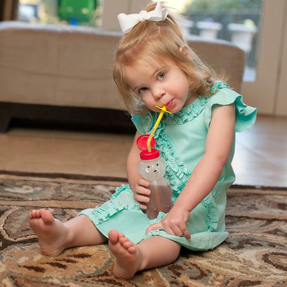 ARK_BEAR_Bottle_girl_sitting_drinking_from_bottle