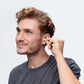 Alpine_Swim_safe_ear_plugs_being_put_into_mans_ears