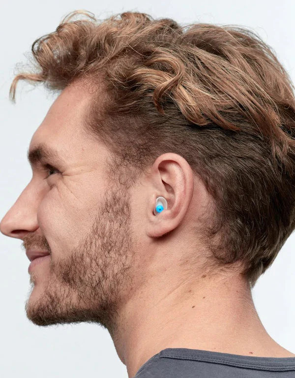 Alpine_Swim_safe_ear_plugs_in_mans_ears