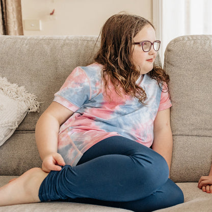 Comfort_On_The_Spectrum_Leggings_navy_girl_sitting