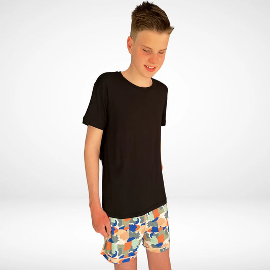 Comfort_on_the_spectrum_boy_wearing_camo_pyjamas