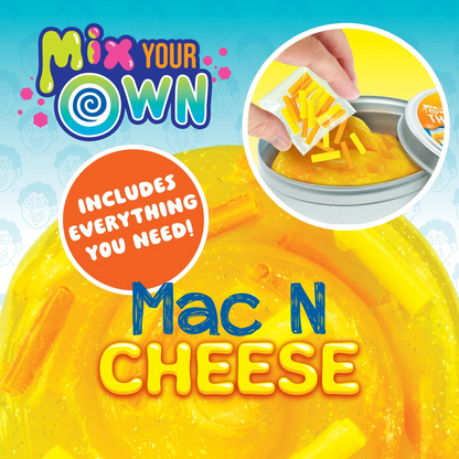 Product packaging for 'Mix Your Own Mac N Cheese' with a hand adding cheese to a bowl.