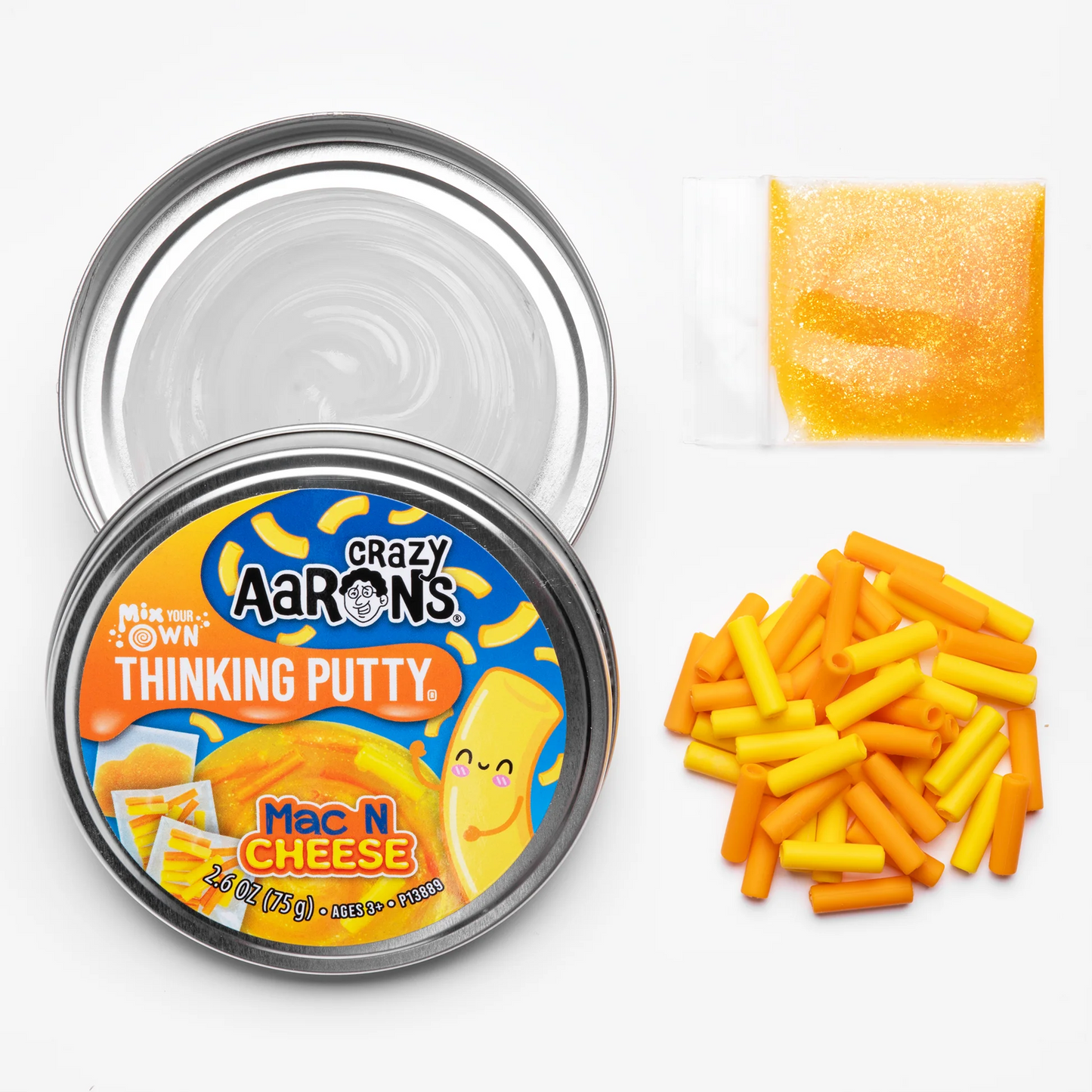 Crazy Aaron's Thinking Putty Mac N Cheese container with putty pieces on a white background
