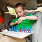 Fat_Brain_Toys_Minisquigz_boy_in_car