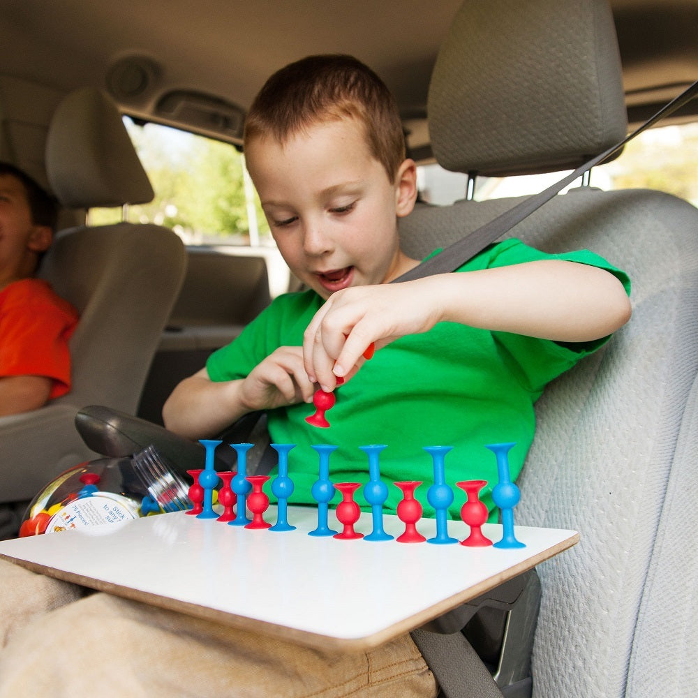 Fat_Brain_Toys_Minisquigz_boy_in_car