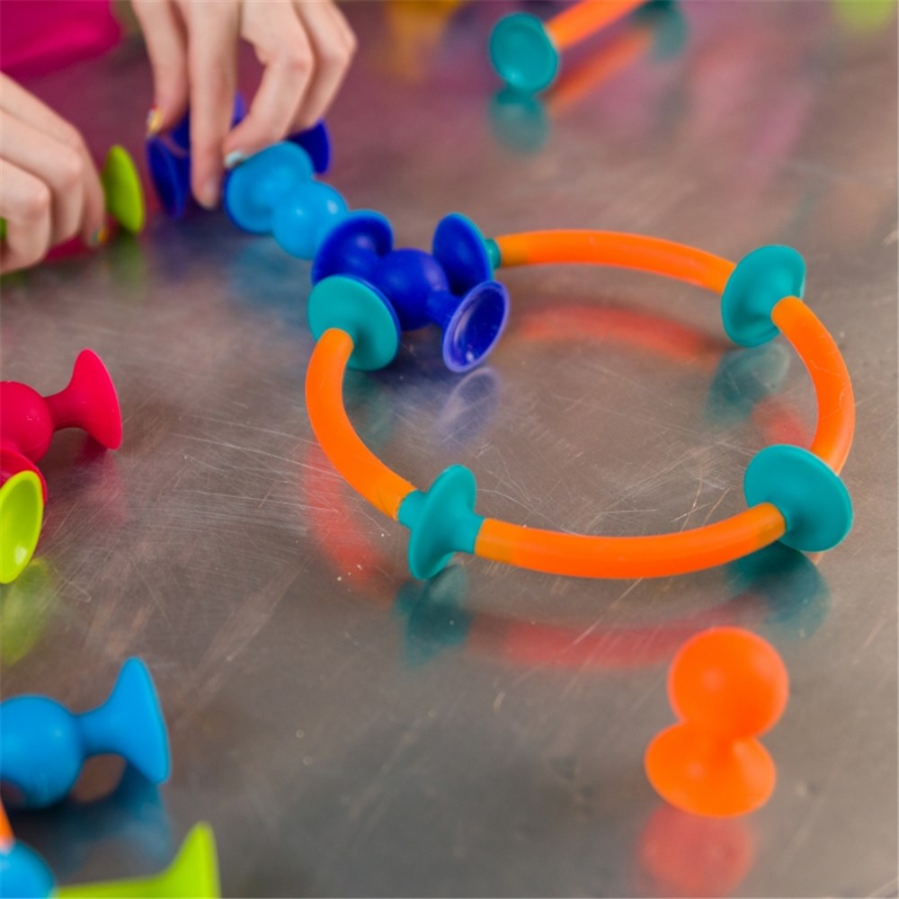 Fat_Brain_Toys_Squigz_Toobz_Kids_creating_shapes_and_builds