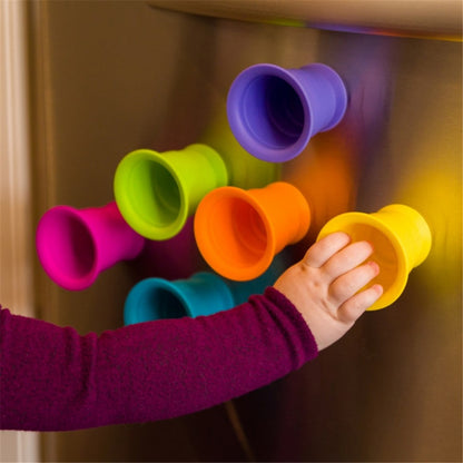 Fat_Brain_Toys_Stacking_kupz_stuck_onto_the_fridge