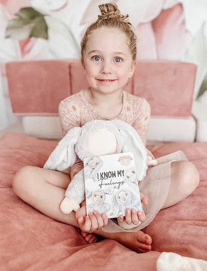 Feelings_friend_girl_sitting_with_bunny_blank_face_with_book