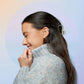 Flare_Calmer_Soft_woman_with_buds_in_her_ear