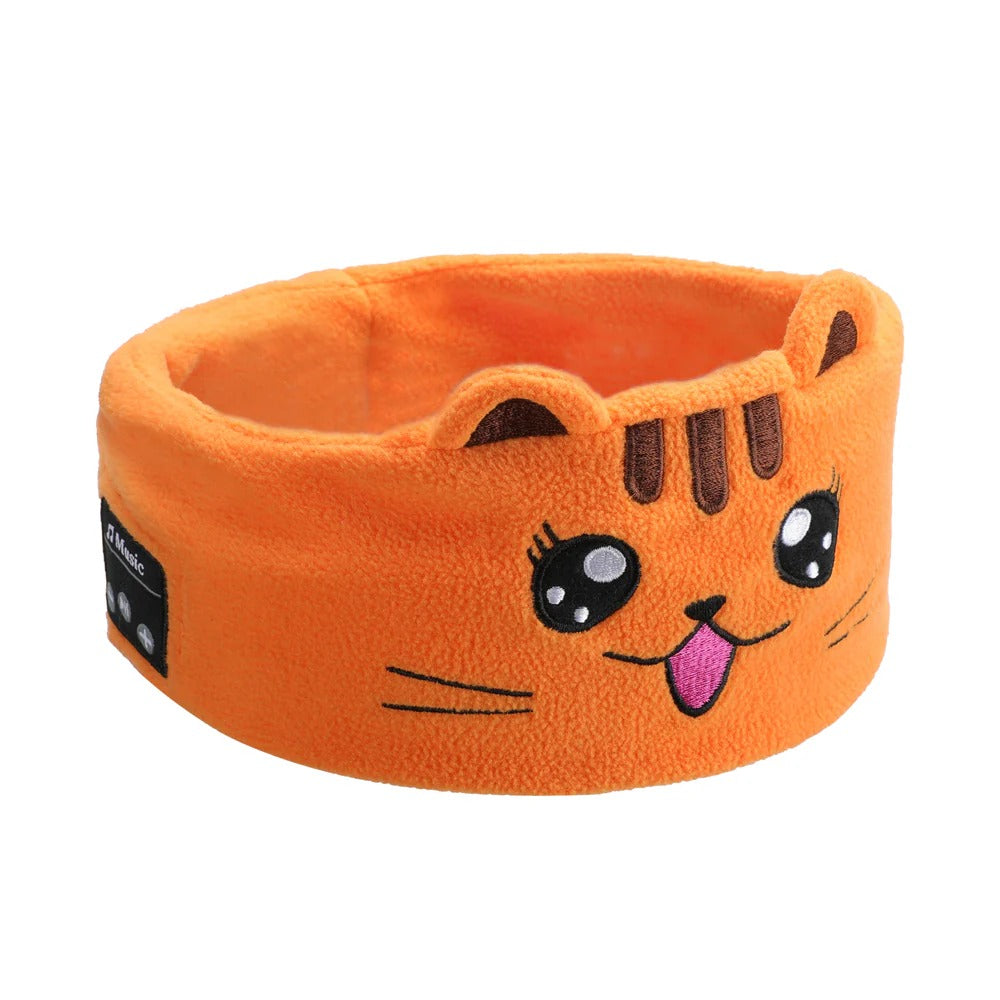 Orange cat-shaped headband with a happy face design on a white background. JOEYZ_soft_headphones_tiger
