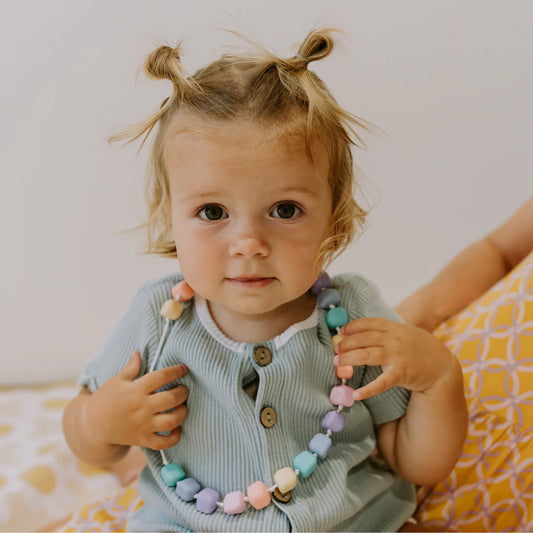 Jellystone_design_Pastel_Rainbow_Princess_and_the_Pea_Necklace_on_child