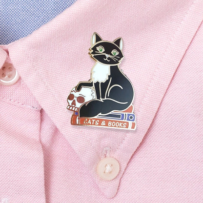 Jubly-Umph_Cats_and_Books_on_pink_fabric
