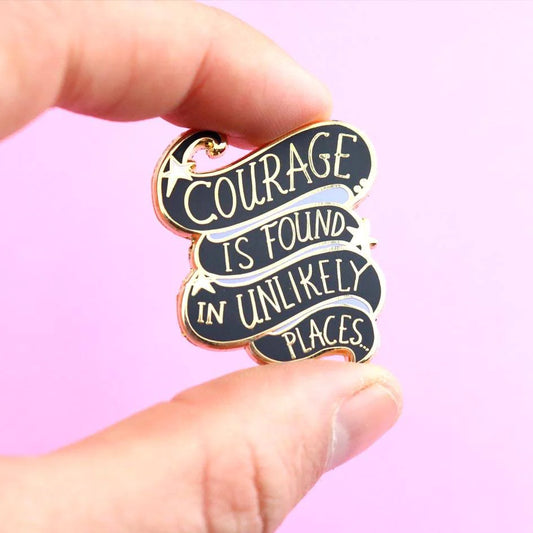 Jubly-Umph_Courage_is_Found_in_unlikely_places_pinched_between_two_fingers