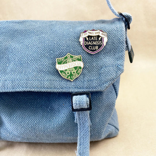 Jubly-Umph_Hyperfocus_Lapel_Pin_backpack