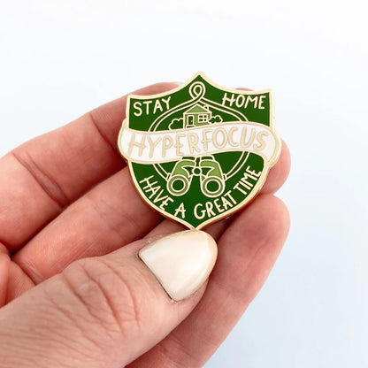 Jubly-Umph_Hyperfocus_Lapel_Pin_in_hand