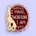 Enamel pin with text 'I Make, Therefore I Am' and scissors on a pink background
