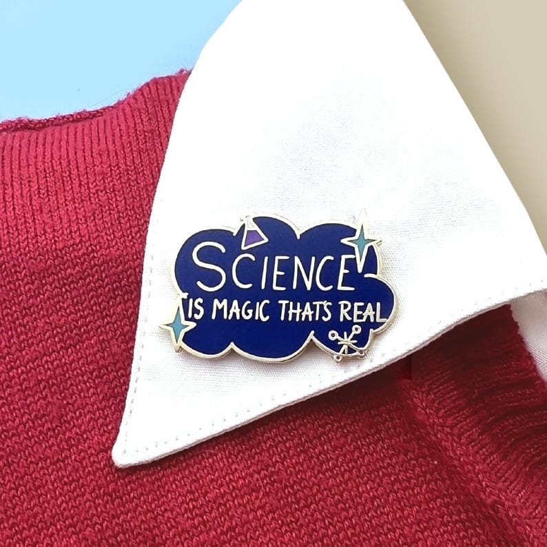 Jubly-Umph_Science_is_the_magic_that_is_real_lapel_pin_on_collar