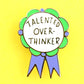 Jubly-Umph_Talented_Over_Thinker_Lapel_Pin_Origional_on_bright_yellow_background