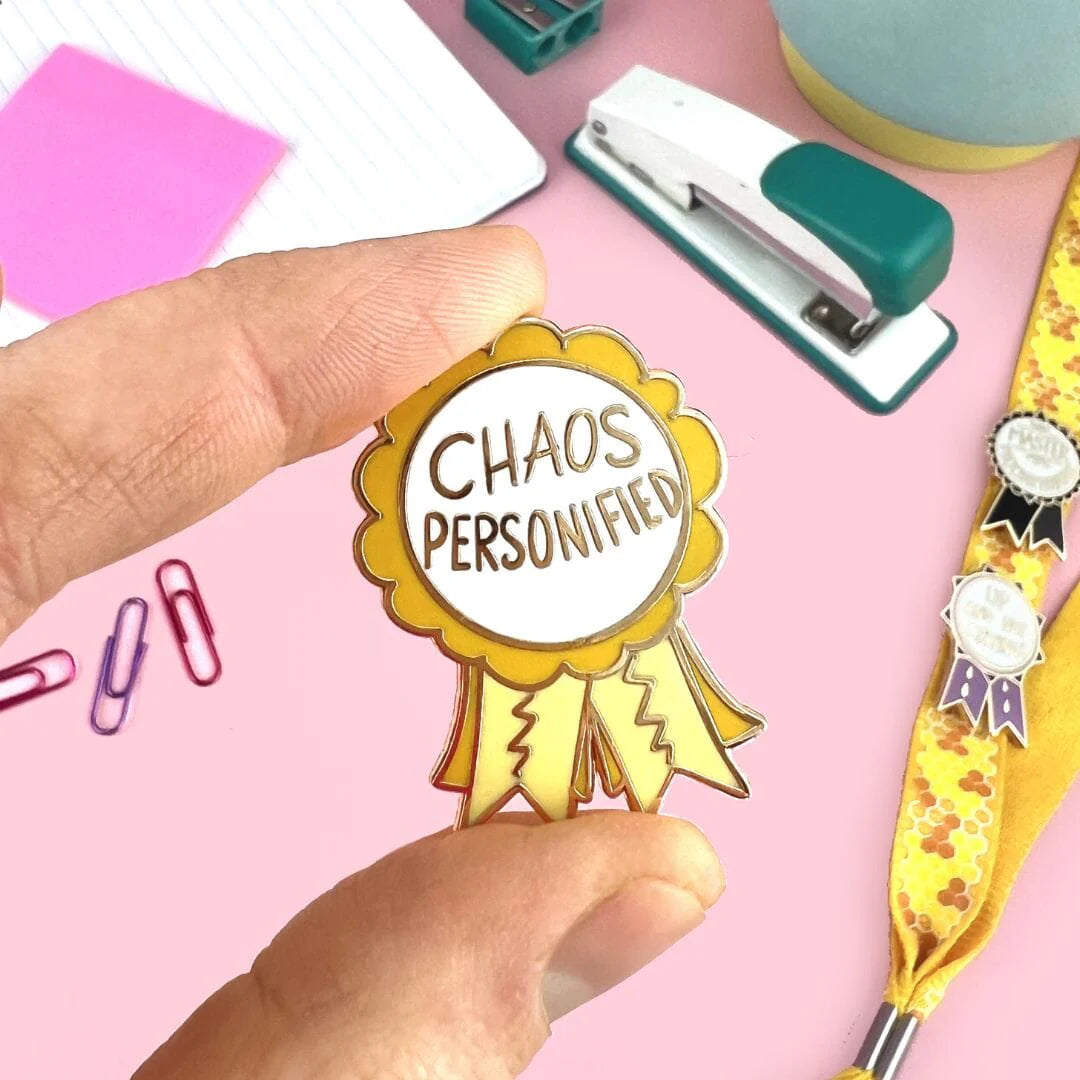 Jubly_Umph_Chaos_Personified_Lapel_Pin_in_fingers