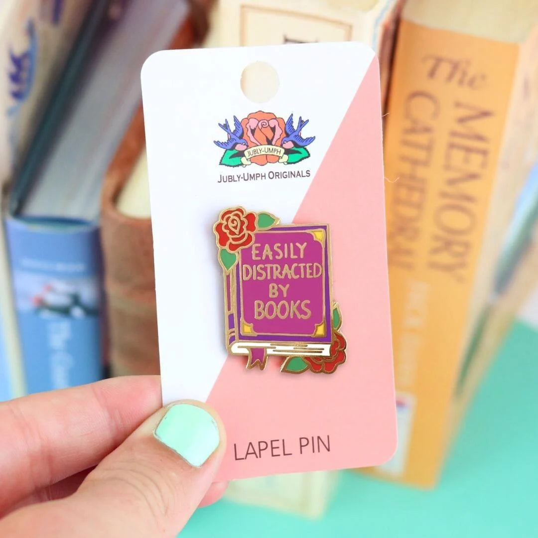 Jubly_Umph_Easily_Distracted_By_Books_Lapel_Pin_on_card_backing