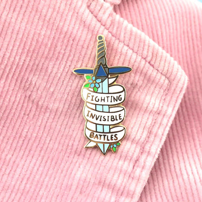 Jubly_Umph_Fighting_Invisible_battles_Lapel_pin_on_pink_jacket