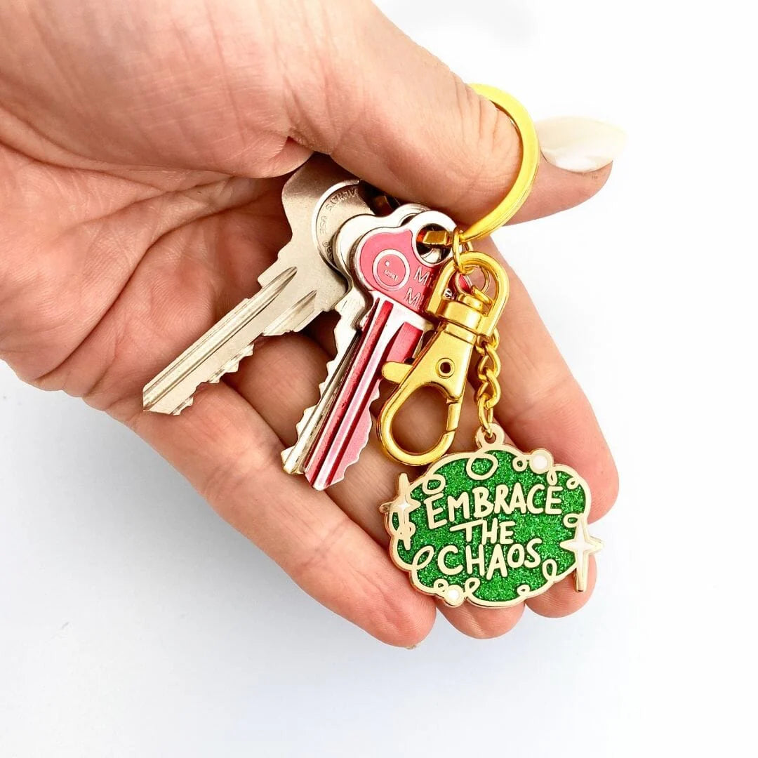 Jubly_Umph_Keychain_Embrace_the_chaos_in_hand