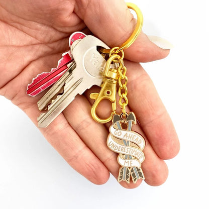 Jubly_Umph_Keychain_go_ahead_underestimate_me_in_hand_with_keys
