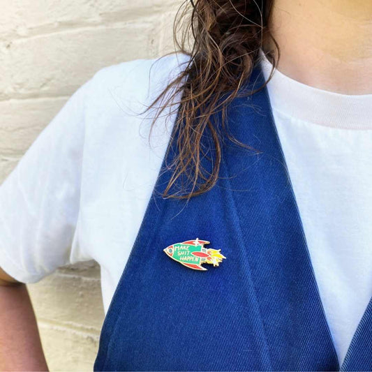 Jubly_Umph_Make_Shit_Happen_Lapel_Pin_on_jumper