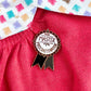 Jubly_Umph_Master_Procrastinator_-Lapel_Pin_on_jumper