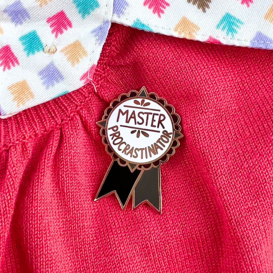 Jubly_Umph_Master_Procrastinator_-Lapel_Pin_on_jumper