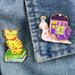 Jubly_Umph_Pin_Books_are_purrfect_lapel_pin_on_denim_jacket