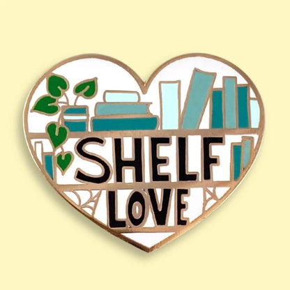 Jubly_Umph_Shelf_Love_Lapel_pin_on_yellow_background