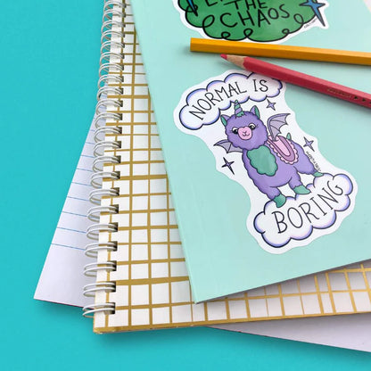 Jubly_Umph_Sticker_normal-is-boring_on_book