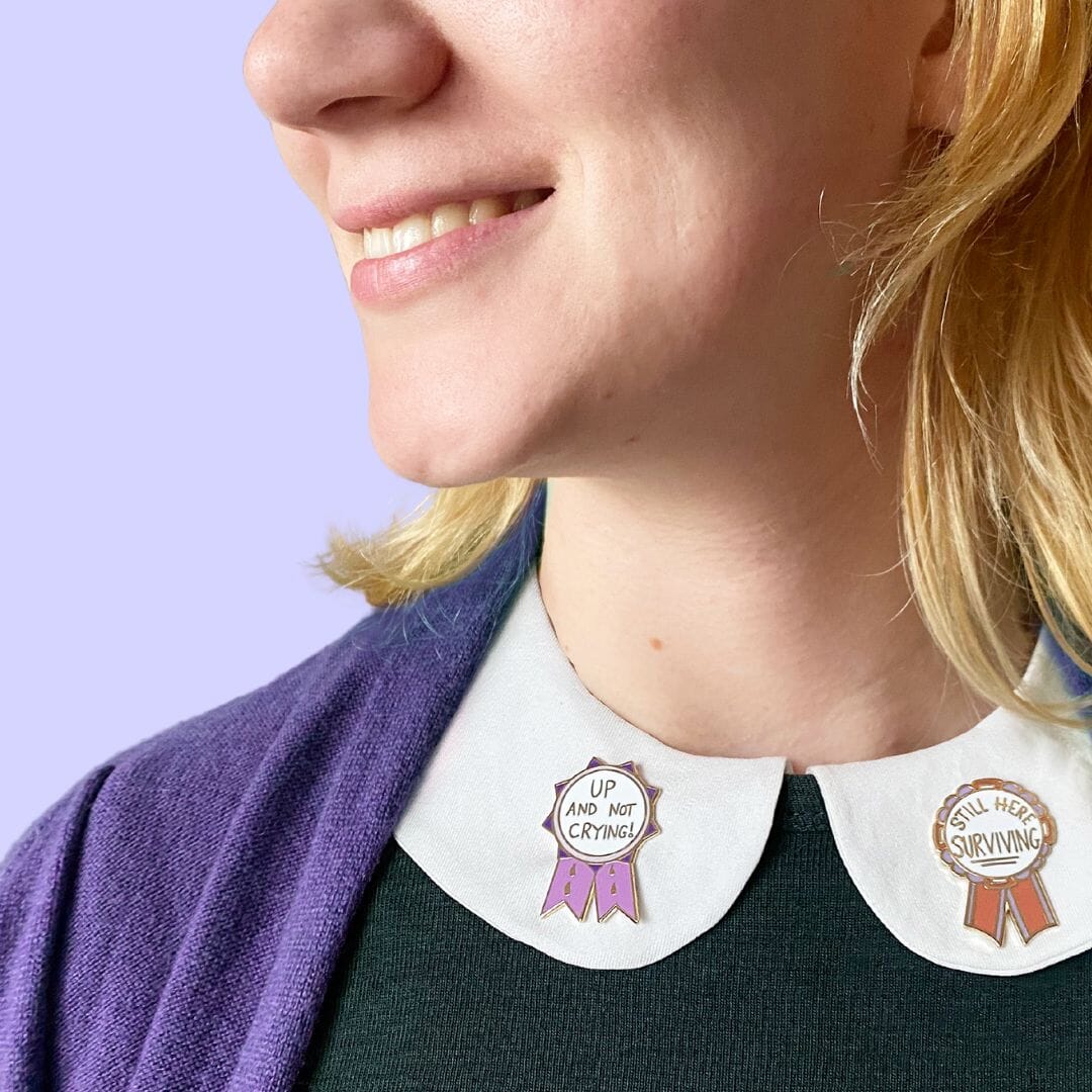 Jubly_Umph_Still_here_surviving_lapel_pin_on_lapel