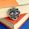 Pin on a stack of books with 'Difficult & Defiant' text