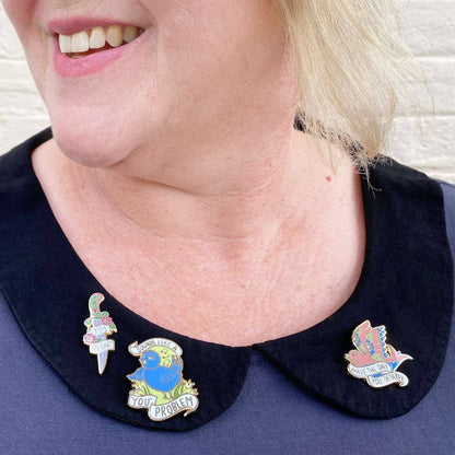 ubly_Umph_im_blunt_lapel_pin_lady_wearing